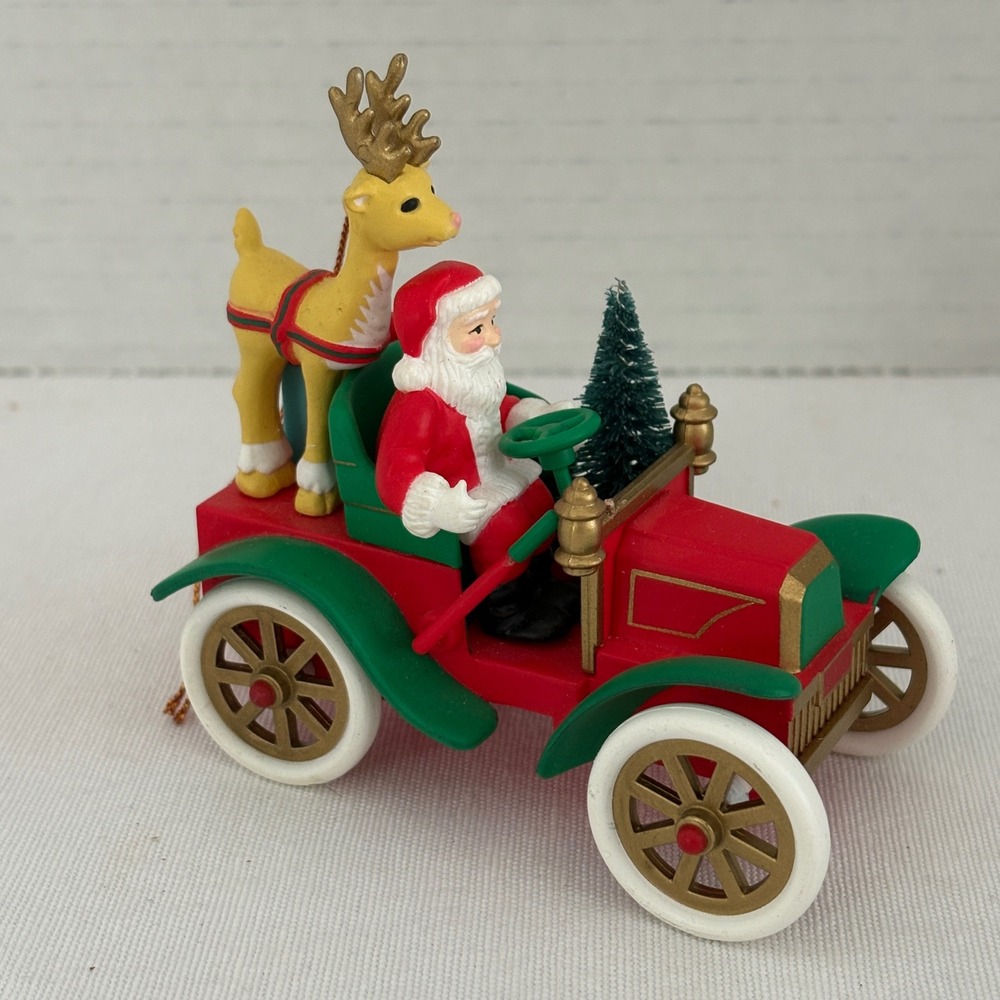 Vintage 1991 National Rennoc Santa in Red Car with Reindeer Christmas Ornament